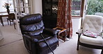 Living room, help or walking stick in empty aid house, nursing home or space with relax armchairs or furniture. Retirement mobility, disability or cane healthcare in residential property or hospice