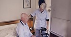 Bedroom, disability and nurse with senior man for healthcare, wheelchair assistance and medical support. Nursing home, retirement and caregiver helping sick, disabled and elderly patient from bed