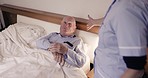 Nurse, retirement and senior man in bed for healthcare, disability assistance and medical support. Nursing home, morning and caregiver helping sick, disabled and elderly patient with wheelchair