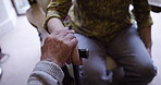 Hands, senior and cancer care, support and grief in retirement home and touching for comfort. Elderly, empathy and closeup of mature people with trust or hope and walking stick as help