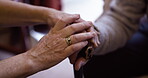 Hands, couple and senior people in support, care and hope in retirement home and touching for comfort. Elderly, help and closeup of trust and walking stick in nursing for counseling or therapy