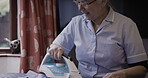 Old woman, ironing and house work with retirement,
conversation, housekeeping with laundry and spring cleaning. Hygiene, housekeeper or caregiver in nursing home, help and wellness with lifestyle