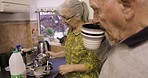 Happy senior couple, kitchen and coffee with conversation at breakfast time in home together. Morning chat, tea and old man with woman enjoying retirement, hot drink and marriage with smile and love.