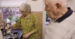 Kitchen, home and tea with old couple and conversation and smile at breakfast time in home together. Morning chat, coffee and old man with woman enjoying retirement, hot drink and marriage with love.