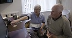 Nursing home, computer and nurse with elderly man at desk learning online technology, email and internet. Retirement support, communication and caregiver helping talking and teaching senior patient