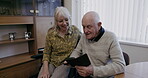 Old couple with smartphone, communication and retirement together, man and woman with technology and mobile app. Social media, contact with family and scroll news website, talking and relax at home