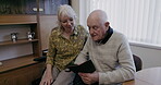 Nursing home, phone and senior couple on internet, social media or app in living room, relax and conversation. Real elderly people, woman with partner or friends reading disability, retirement blog