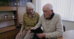 Retirement, phone and senior couple on internet, funny post or meme in living room, relax and conversation. Real elderly people, woman with partner or friends reading disability blog at nursing home