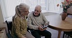 Senior man, woman and mobile phone in home on social media, internet and online news app. Old couple, cellphone and connection in living room, house and apartment with technology, network and search 