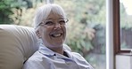 Elderly woman, happy with laugh and face, retirement and relax in nursing home with funny chat and wellness. Comedy, happiness and old person with smile, portrait and pension with positive mindset