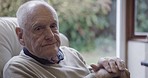 Thinking, senior man waiting and elderly disability of a old person in a nursing home. Sofa, living room and grandpa rest and relax on a couch with walking stick in retirement with sad memory