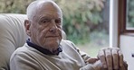 Thinking, senior man and elderly disability of a person in a nursing home in retirement. Sofa, living room and grandpa rest and relax on a couch with a walking stick in a house with memory and idea