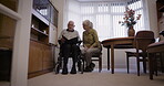 Elderly, couple with album and memory of life together, retirement and relax, communication and pictures. Love, care and retired people in nursing home, memories and talking with old man and woman