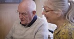 Retirement, love and old couple talking, bonding and relax with conversation, memories and romance. Retired, mature man and elderly woman in living room, happiness or loving together for relationship