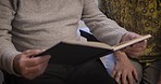 Book, relax and senior couple reading story together, bonding and enjoying quality time in house. Love, storytelling and elderly retired man and woman study or read novel, literature or books in home