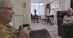 Calm, relax and senior couple with coffee for peace, communication and retirement in a home. Speaking, company and elderly man and woman drinking tea in the morning while talking in the living room