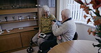 Health, blood pressure and disability with a senior couple together in their retirement home for wellness. Medical, cardiovascular and wheelchair with a mature man and woman testing for hypertension