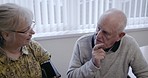 Blood pressure, couple and confused seniors discuss how to with health measuring machine in a living room. Hypertension, monitoring and elderly man with woman for reading, heart and cholesterol issue