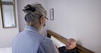 Covid, tea or assisted living with a nurse and patient lying in the bedroom of a retirement home from above. Healthcare, morning and coffee with a woman medicine professional and senior man in bed