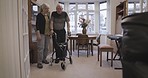 Senior couple, disability and care with old woman supporting partner with a walker. Trust, marriage care and nursing home with elderly people together in retirement house and living room lounge