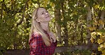 Summer, woman and in nature for peace, happiness and enjoy quality time outdoor, balance and calm. Female, girl and forest, happy person with good day and carefree with trees, countryside or sunshine