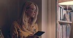 Night, thinking and woman with a smartphone, typing and connection for social media, texting and chatting. Mature female, person and lady with cellphone, mobile app and happiness with ideas or wonder