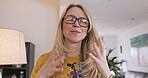 Woman, portrait and talking on a video call or webinar while happy, excited and wave bye with hands. Face of a mature female influencer speaking at webcam in her home while recording for online blog