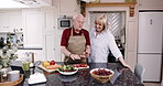Chef, food and happy senior couple in kitchen at home cooking a healthy. Teamwork or partnership, family and collaboration with man and woman preparing dinner following the recipe with vegetables