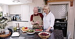Food, chef and happy elderly couple in kitchen at home cooking a meal. Collaboration, healthy food for lunch or dinner and teamwork with man explaining to woman the recipe with organized vegetables.