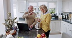 Smoothie, laptop and senior couple in a kitchen watching online video, tutorial and making healthy drink for wellness. Happy, love and old people taste health shake together enjoying retirement