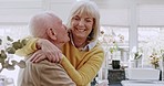 Happy, relax and senior couple hug, home and bonding for relationship, anniversary and affection. Romance, elderly woman and mature woman embrace, romantic and partners with retirement and happiness