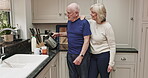 Retirement, tea and senior couple with kettle preparing morning coffee in the kitchen. Marriage, love and hot beverage on cup or mug for drink with senior man and senior woman together at their home 