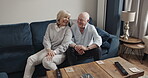 Happy, love and senior couple laughing at funny retirement joke, comedy humour and enjoy quality time together. Bond, marriage happiness and elderly man, old woman or people laugh in home living room