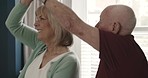Happy senior couple, dance and spinning in home for love, romance and quality time together in retirement. Old man, elderly woman and dancing to music with happiness, smile and support in living room