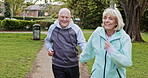 Health, senior couple and running for exercise, fitness and wellness being healthy together in nature. Retirement, man and woman enjoy workout and jog in a park or garden
