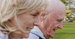 Health, senior couple and walking for exercise, fitness and wellness being healthy together in nature. Retirement, man and woman enjoy workout in a park or garden