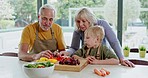 Cooking, grandparents and child with breakfast food in the kitchen of a house. Elderly man and woman preparing a healthy meal with their grandson at home