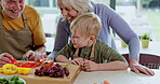 Cooking, grandparents and child with breakfast food in the kitchen of a house. Elderly man and woman preparing a healthy meal with their grandson at home