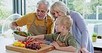Cooking, grandparents and child with breakfast food in the kitchen of a house. Elderly man and woman preparing a healthy meal with their grandson at home