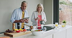 Cooking, senior couple and breakfast food in the kitchen of a house using a tablet online. Elderly man and woman preparing a lunch on the stove at home