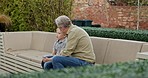 Senior man and grandson bonding together in a garden with conversation and support. Love, relationship and advice with a relax grandfather having a discussion with family