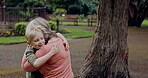 Young boy running to hug grandmother in park, garden and outdoor for love, care and support. Excited kid, senior woman and embrace with happiness together