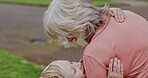 Young boy hugging grandmother in park, garden and outdoor for love, care and playing together. Happy kid, senior woman and embrace with smile for fun