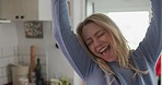 Dance, happy and a woman in a home kitchen with fun, energy and playful in the morning. Smile, excited and a mature person or dancing girl being carefree with stress relief in a house on the weekend