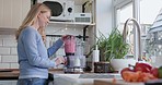 Happy woman, smoothie and blender in kitchen with detox, fruits and nutrition drink at home. Breakfast, weight loss and female person smile with cooking and nutritionist food in the morning in house