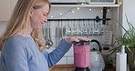 Woman, smoothie and blender in kitchen with detox, fruits and nutrition drink at home. Breakfast, weight loss and female person smile with cooking and nutritionist food in the morning in a house
