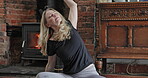 Stretching, yoga and energy with woman in living room for mental health, spiritual and fitness. Zen, meditation and balance with female person at home for relax, floor workout and mindfulness 