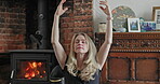 Stretching, yoga and relax with woman in living room for mental health, spiritual and fitness. Zen, meditation and balance with female person at home for energy, floor workout and mindfulness 
