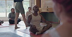 Yoga, coaching and meditation with teacher in studio for fitness, health and workout. Wellness, spiritual and exercise with group of people in class for pilates, mindfulness and holistic healing