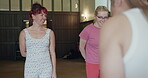 Yoga class, group and woman talking with happy communication, community or social gym chat. People, relax and speaking about exercise, training or pilates workout with personal trainer or instructor